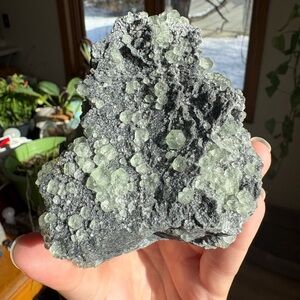 Witchy green fluorite on black chalcedony specimen